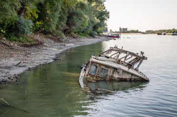Novi Sad, Serbia - September 29. 2019: The wreck of the tanker at the Danube River in Novi Sad