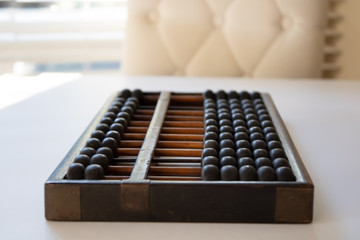 Old abacus for subtraction, division and multiplication.education mental math.count, add, subtract, multiply.Chinese math and history science.