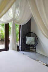 A chair in a corner of a modern interior, a cozy corner in room