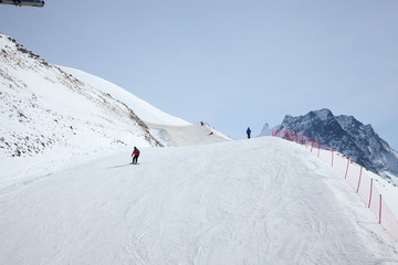 Fototapeta na wymiar The Caucasus mountains and the ski resort 