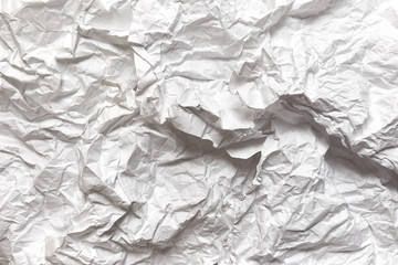 many sheets of crumpled paper with selective focus