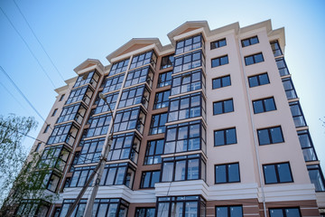 New multistorey residential building. Apartments in a new house.