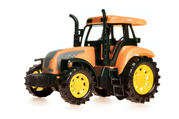 children's toy small green toy tractor isolated on white background