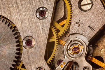 vintage old mechanism with gears and springs, clock mechanism close-up macro
