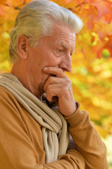 Close up portrait of senior man outdoors