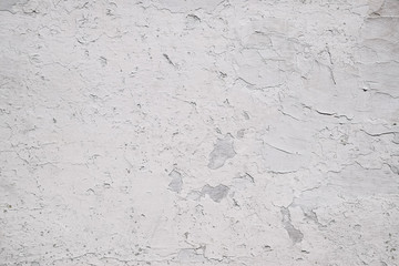 Stucco on the wall in white. texture of painted old wall.