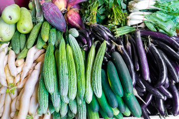 Various vegetables on the counter. organic fresh fruits and vegetables on grocery counter. Selling...