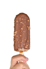 female hand holding chocolate popsicle