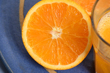orange fruits and a glass of juice