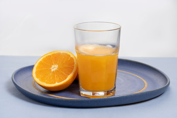 orange fruits and a glass of juice