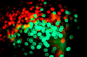 Holographic bokeh colorful lights, festive background. Party concept. Holiday concept. Christmas time concept. New year backdrop