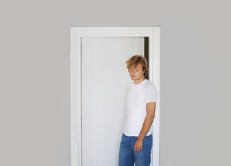 Fototapeta na wymiar Man opening the door of him home.