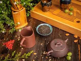 Preparation of the tea ceremony, tea in the bowl. Handmade cups