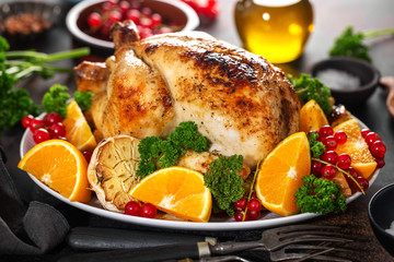 Whole baked chicken with vegetables