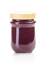 Raspberry jam in jar.