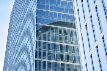 Panoramic and perspective wide angle view to steel light blue background of glass office building commercial modern city of future. Business concept of success industry tech architecture. 