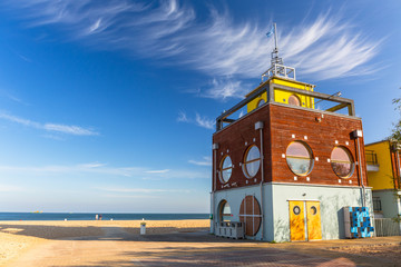 Beautiful beach with lifeguards house at Baltic Sea in Gdansk, Poland - obrazy, fototapety, plakaty