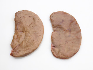 two raw calf livers over head shot
