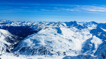Winter mountain landscape with mountains and blue sky. Molltaler Gletscher. Austria