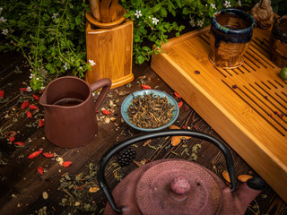 Preparation of the tea ceremony, tea in the bowl. Handmade cups