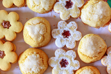 shortbread and coconut biscuits on a wood background