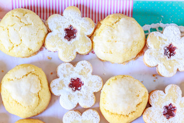shortbread and coconut biscuits on a wood background