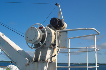Image of a fragment of a cargo crane on a ship