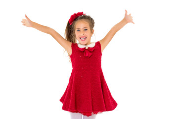 Joyful girl with arms raised.