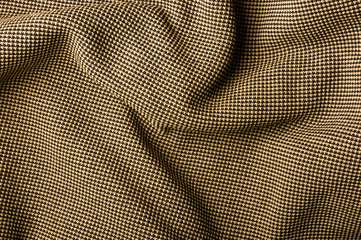 clothing items stonewashed cotton fabric texture with seams, clasps, buttons and rivets, macro
