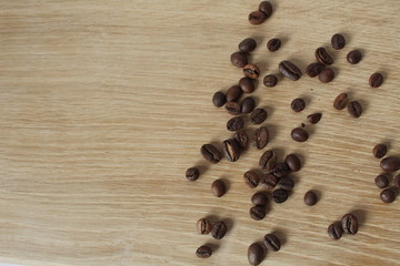 Arabica coffee beans coffee on wooden background