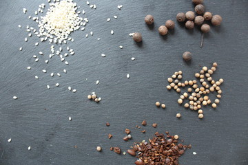 assorted spices on a gray background