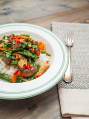 Yellow thai curry - chicken with vegetables lunch - copy space