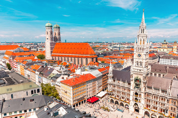 Panoramic aerial view of Munich Central square with town hall and Frauenkirche Church. Travel and sightseeing landmarks in Germany - obrazy, fototapety, plakaty