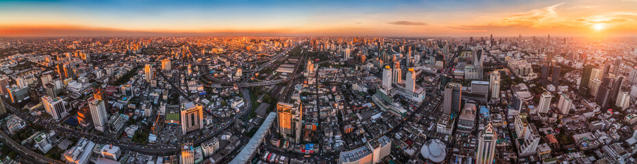 Fototapeta na wymiar Wide Panoramic View of Bangkok, Thailand. Cityscape with Skyscrapers at Sunset