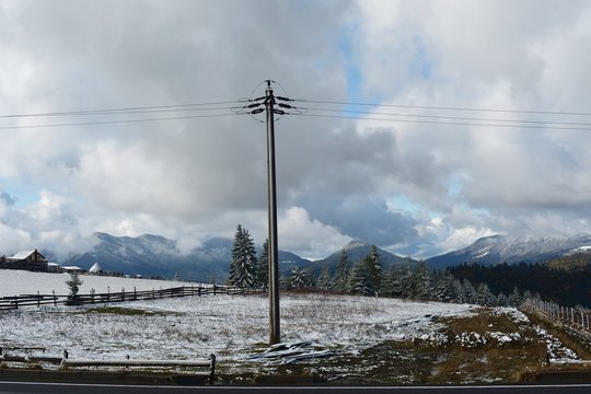 Landscape at Tihuta Pass with the first snowfall in autumn. Tihuta Pass is a high mountain pass in the Romanian Eastern Carpathian Mountains connecting Transylvania with Bukovina, Moldavia.
