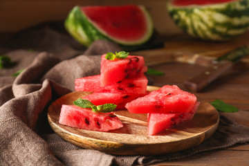 Slices of tasty watermelon on plate