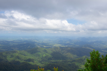 High Hilltop Lookout On A Overcast Moody Day Overlooking Lush Green Hills And Valley In Australia