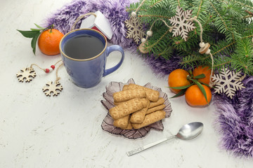 The tangerines, christmas cookies and a cup of herbal tea