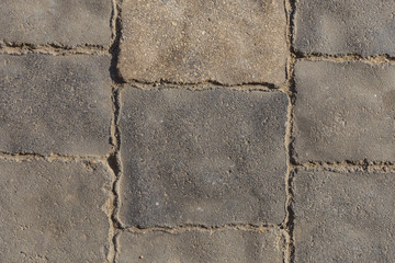 Obraz premium Paving from tiles. Graphic element on a stone. Construction product.