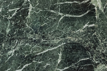 The dark green marble. Facing stone. Texture