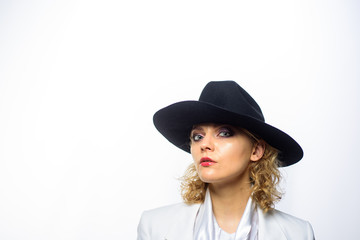 Trendy outfit. Seasonal fashion. Happy woman in autumn style. Sensual girl in black hat. Autumn vogue trend. Autumn fashion. Sexy girl with bright makeup. Stylish sexy blond model.