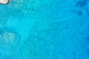 An aerial view of the beautiful Mediterranean sea, where you can se the rocky textured underwater...