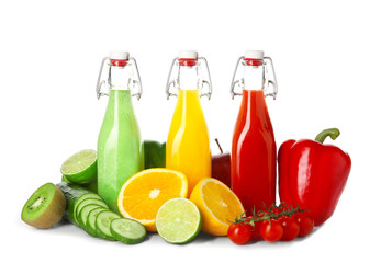 Bottles of fresh juice isolated on white