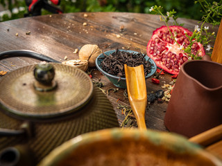 Preparation of the tea ceremony, tea in the bowl. Handmade cups