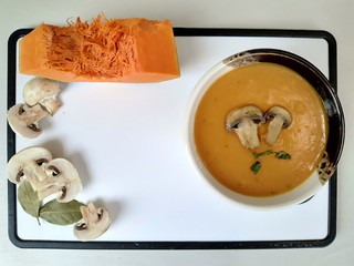 Cream soup with pumpkin and mushrooms