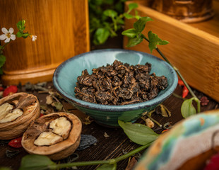 Preparation of the tea ceremony, tea in the bowl. Handmade cups