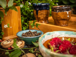 Preparation of the tea ceremony, tea in the bowl. Handmade cups