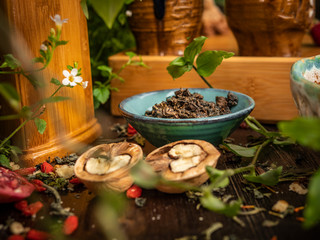 Preparation of the tea ceremony, tea in the bowl. Handmade cups