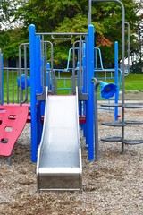 Playground slides on cold fall day