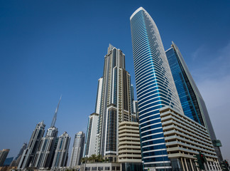 Fototapeta na wymiar Dubai Cityscape. Street level view of Al Saada street, Business Bay. Dubai. United Arab Emirates